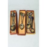 Three small boxes containing a quantity of collectors spoons
