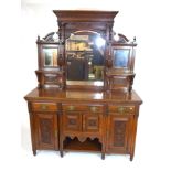 Late Victorian American walnut sideboard with triple mirrored back and base with three drawers and