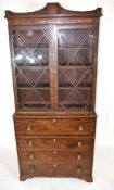 Georgian mahogany secretaire cabinet, top section with a shaped cornice over astragal glazed doors