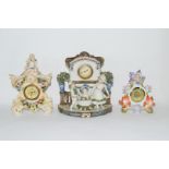 Three examples of Continental porcelain clock mantel cases