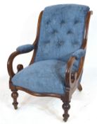 Victorian mahogany framed armchair with show wood frame, scrolled arms and turned front legs with