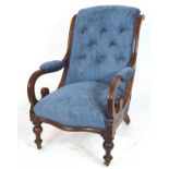 Victorian mahogany framed armchair with show wood frame, scrolled arms and turned front legs with