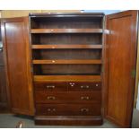 Victorian mahogany linen press cabinet with two large panelled doors opening to an interior with