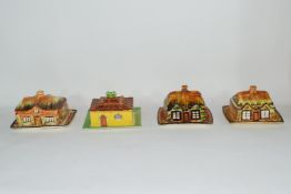 Group of mid-20th century cottage style cheese dish and butter dishes