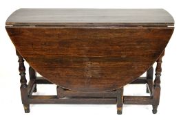 18th century oval oak gateleg table raised on turned legs, 120cm wide Condition: Overall surface