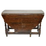 18th century oval oak gateleg table raised on turned legs, 120cm wide Condition: Overall surface