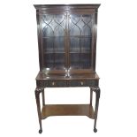 Edwardian mahogany side cabinet with shaped cornice over a top section with two glazed doors and