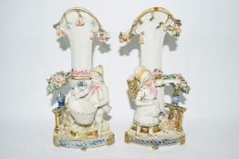 Pair of bisque porcelain spill holder vases