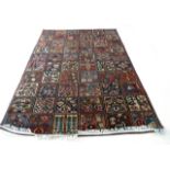 Vintage Persian Baktia Carpet, with all-over panelled design 260cm x 167cm approximately