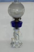 Oil lamp with blue glass reservoir