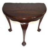 Edwardian mahogany demi-lune side table raised on three cabriole legs with ball and claw feet
