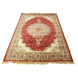 Red ground Kashmir floral medallion design Rug, 240 x 156cm approx