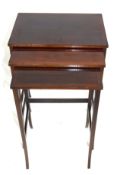 Nest of three Edwardian mahogany and inlaid occasional tables on slender legs, largest 49.5cm wide