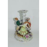 Continental porcelain candlestick in Meissen style