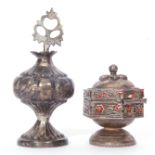 Mixed lot: An Indian silver Kohl bottle, together with a silver and enamelled sindar pot (2)
