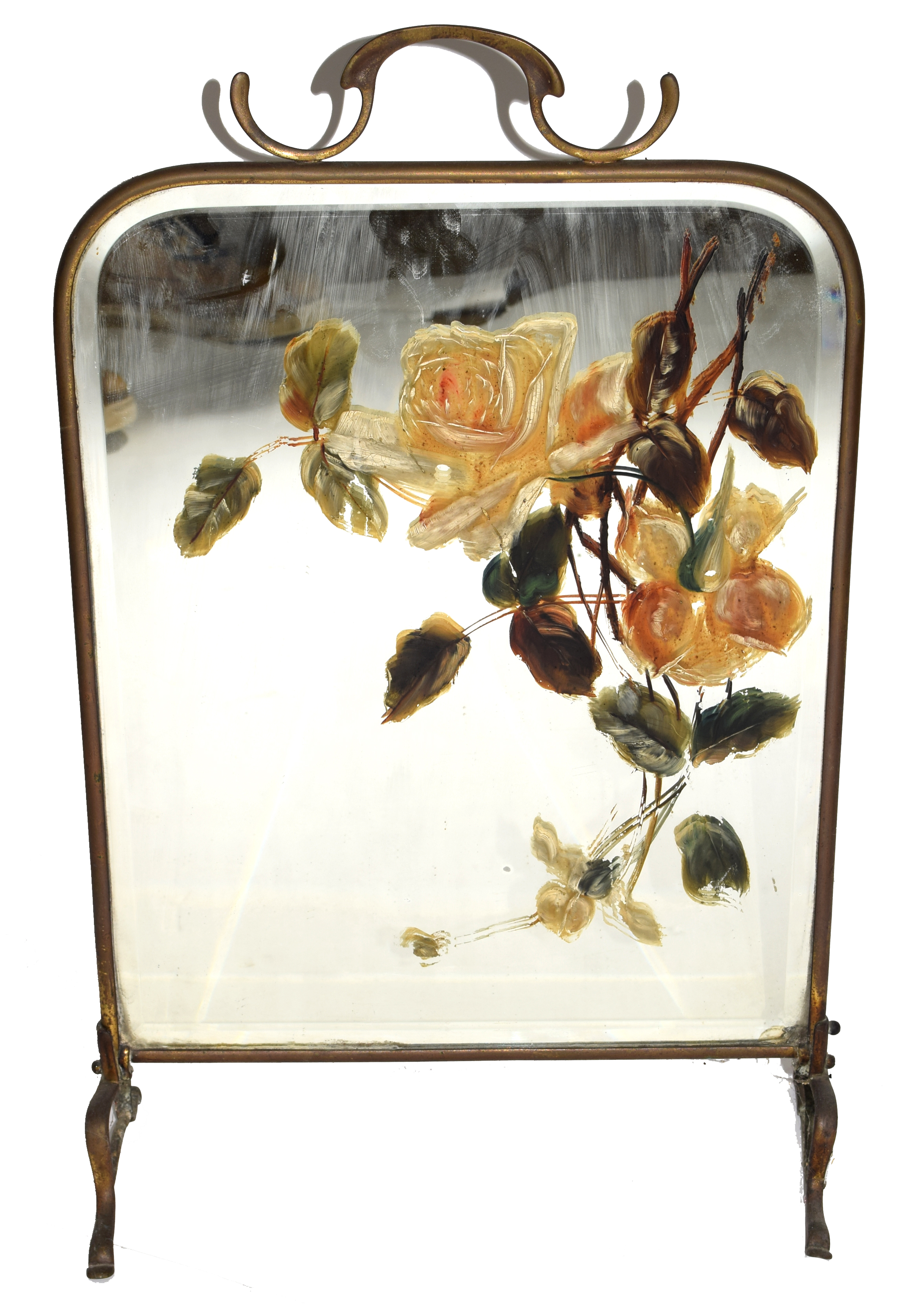 Early 20th century brass framed fire screen with central bevelled mirror with overpainted rose