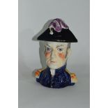 Mid-19th century Staffordshire tobacco jar modelled as Wellington with cover modelled as his hat