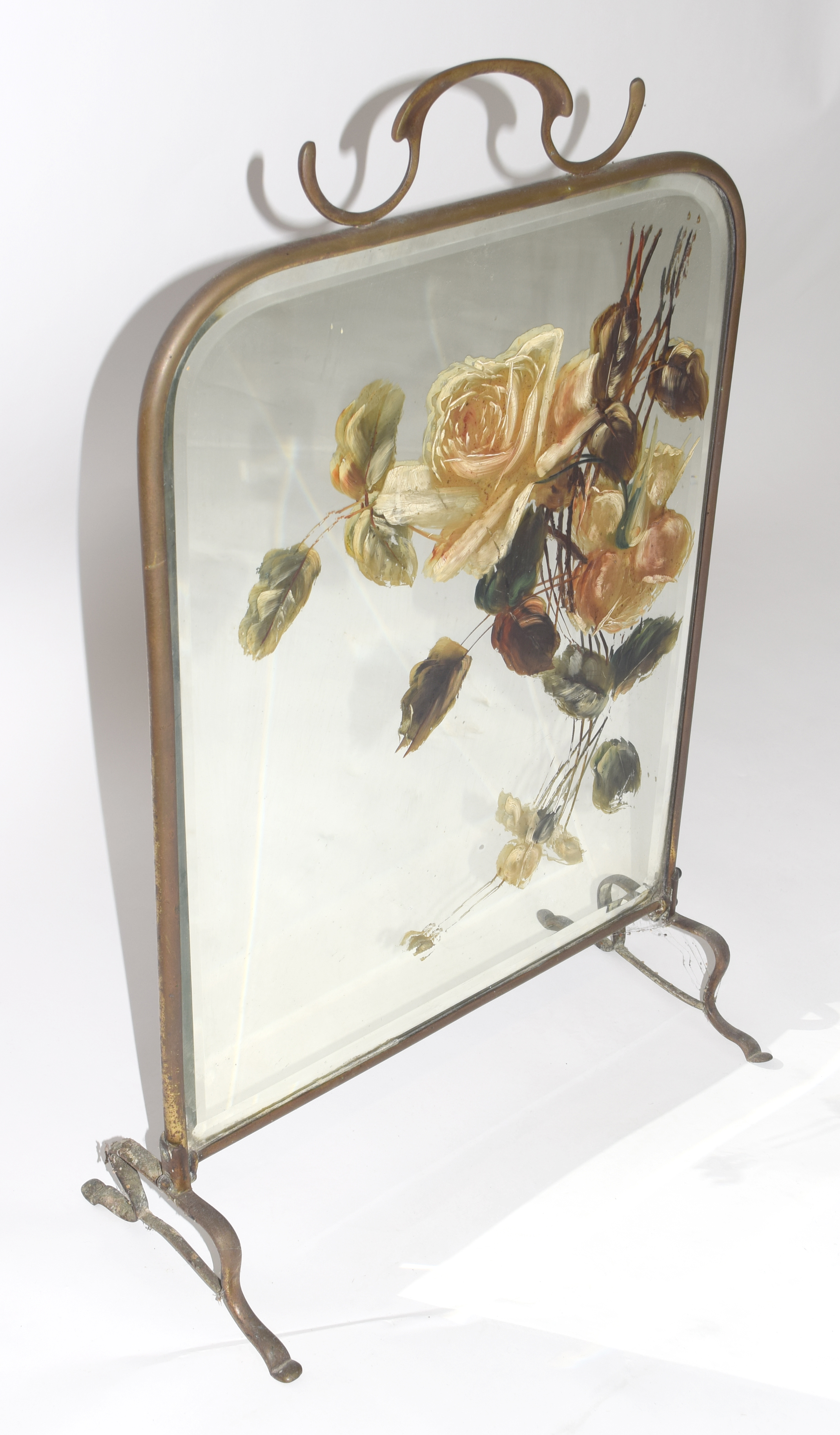 Early 20th century brass framed fire screen with central bevelled mirror with overpainted rose - Image 3 of 4