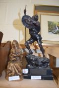 RESIN MODEL OF THE VIRGIN MARY TOGETHER WITH A SPELTER FIGURE OF A BOY SCOUT RAISED ON A WOODEN
