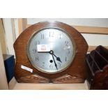 PERIVALE OAK CASED MANTEL CLOCK TOGETHER WITH A BRASS INLAID LETTER RACK