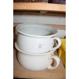 TWO CREAM GLAZED CHAMBER POTS