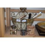 SMALL WALL MOUNTED BASKET CONTAINING VARIOUS ASSORTED BRUSHES, GLASS PAPERWEIGHTS, SILVER PLATED