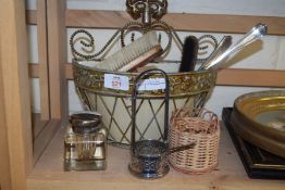 SMALL WALL MOUNTED BASKET CONTAINING VARIOUS ASSORTED BRUSHES, GLASS PAPERWEIGHTS, SILVER PLATED