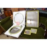 COLLECTION OF RETRO STYLE WALL MIRRORS IN GREEN PLASTIC FRAMES COMPRISING TWO CIRCULAR EXAMPLES, TWO