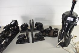 COLLECTION OF HARDWOOD EBONY ELEPHANTS COMPRISING TWO PAIRS OF BOOKENDS, FAMILY OF FIVE ELEPHANTS