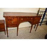 EDWARDIAN MAHOGANY BOW FRONT SIDEBOARD WITH TWO DRAWERS AND ONE DOOR RAISED ON TAPERING LEGS WITH