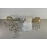 TEN MIXED GLASS AND POTTERY JELLY MOULDS