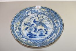 JAPANESE BLUE AND WHITE PLATE DECORATED WITH A PEACOCK