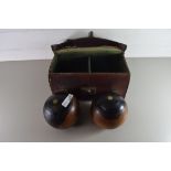 LEATHER CASE CONTAINING TWO LAWN BOWLS