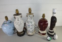 FIVE MIXED TABLE LAMPS TO INCLUDE MODERN ORIENTAL EXAMPLES, AN EXAMPLE FORMED FROM A CARVED ETHNIC