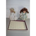 MIXED LOT COMPRISING A BOXED ALBUM TOGETHER WITH TWO PORCELAIN HEADED DOLLS