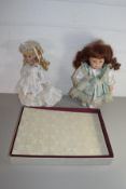 MIXED LOT COMPRISING A BOXED ALBUM TOGETHER WITH TWO PORCELAIN HEADED DOLLS