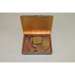 SILVER PLATED CIGARETTE BOX WITH WOOD LINING CONTAINING A LADIES ROTARY GOLD PLATED WRIST WATCH,