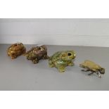 MIXED LOT COMPRISING A BRASS MODEL FLY, THREE POTTERY MODEL TOADS (4)