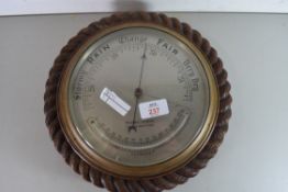 EARLY 20TH CENTURY ANEROID BAROMETER AND THERMOMETER COMBINATION, THE DIAL MARKED 'FISONS (