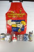MIXED LOT COMPRISING BEER STEINS, SNOOPY MONEY BOX AND A SNOOPY APRON PLUS OTHER ITEMS