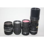Canon EFS 18-55mm lens, a Voigtlander 75mm lens, a Helios lens, an Optomax 85-205mm lens
