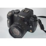 Panasonic Lumix DMCG1 with Lumix 14-15 lens, and Lumix 145-175 lens plus charger and case