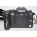 Lumix G1 camera with charger and case