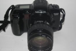 Minolta Dynax 700 SI together with a Minolta AF zoom 28-105mm lens