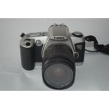 Canon EOS 500N film camera with manual and case together with Canon zoom lens EF28-80mm