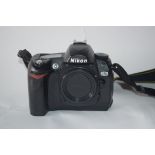 Nikon D70 camera with flash leads and manual
