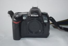 Nikon D70 camera with flash leads and manual