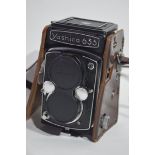 Yashica-635 35mm film camera together with manual, slide, copier, Prinzflex 3 x autoconverter and