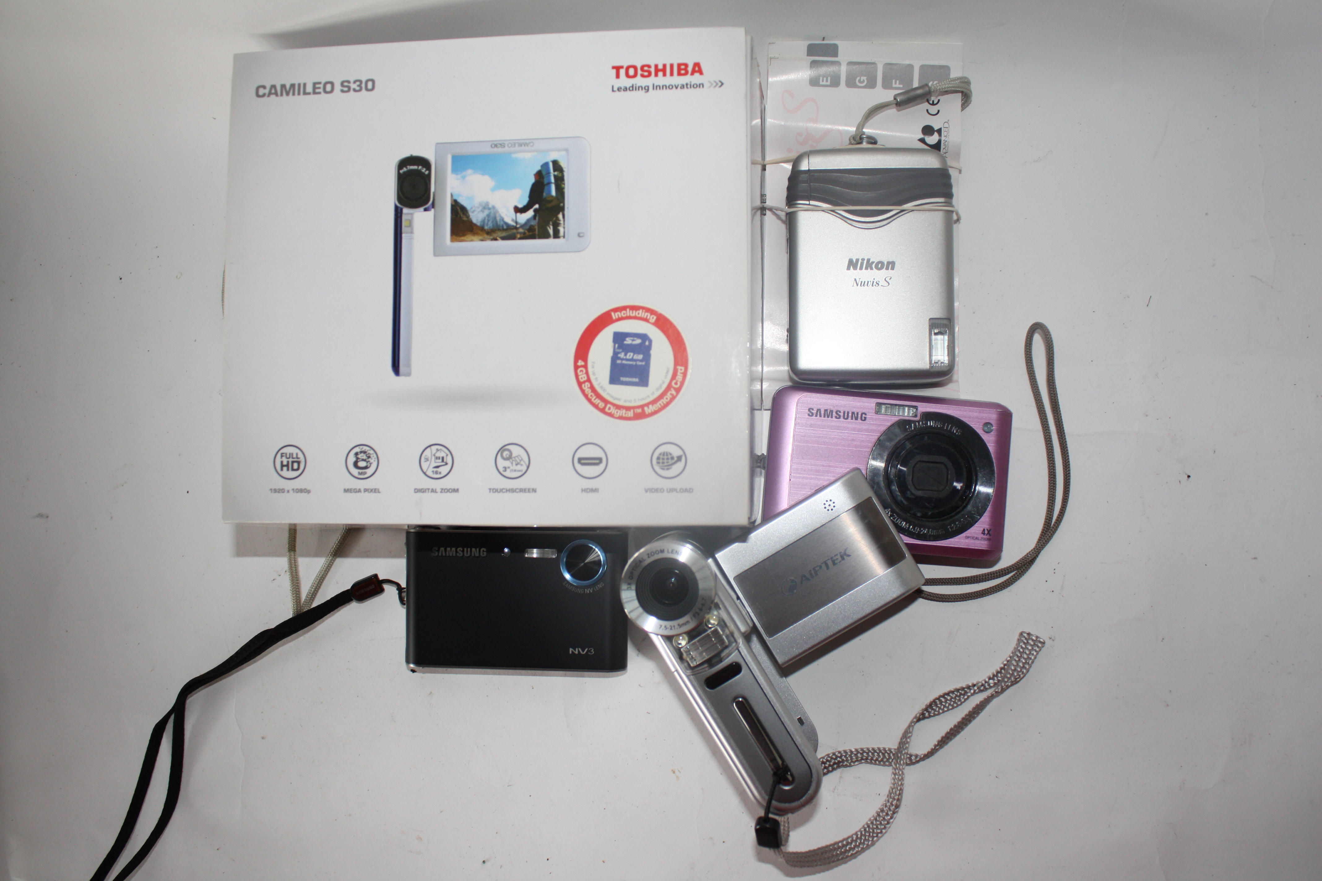 Mixed lot of point and shoot digital cameras to include a Samsung NW3 and a Toshiba Camileo S30