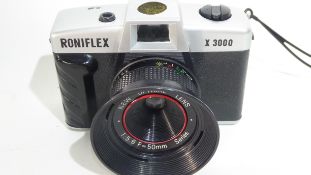 Ilford Sporti film camera together with Roniflex X3000 and a folding pocket Kodak